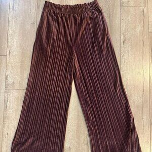 Lightly worn purple velvet pants from Lush size small